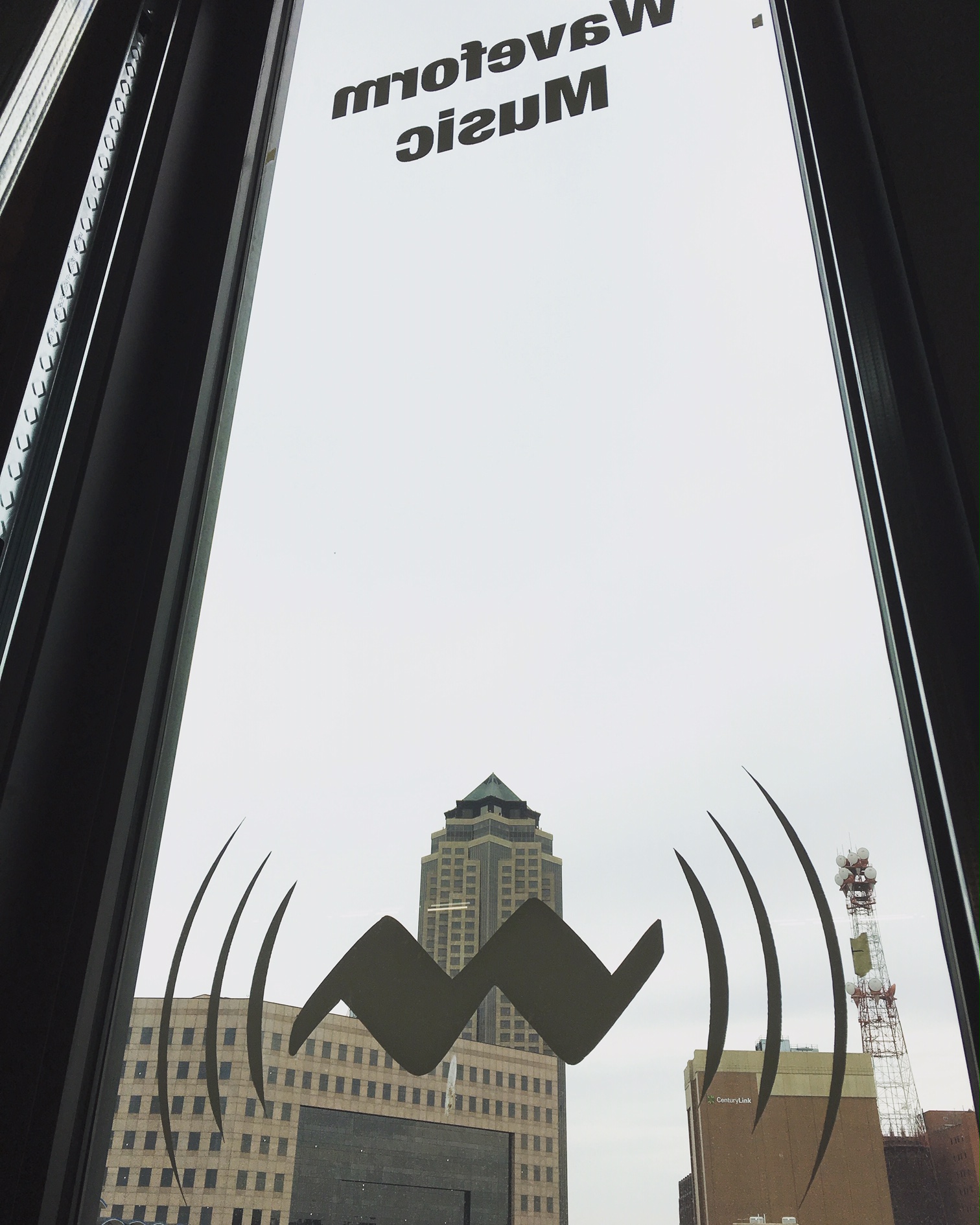 From the top floor of Mainframe Studios, Waveform Music looks out at the Principal Building at 801 Grand.